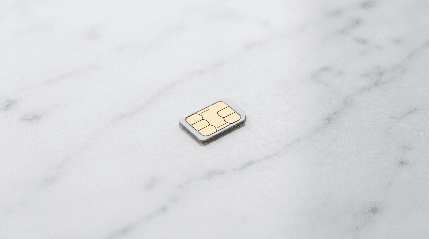 SIM card on white marble surface